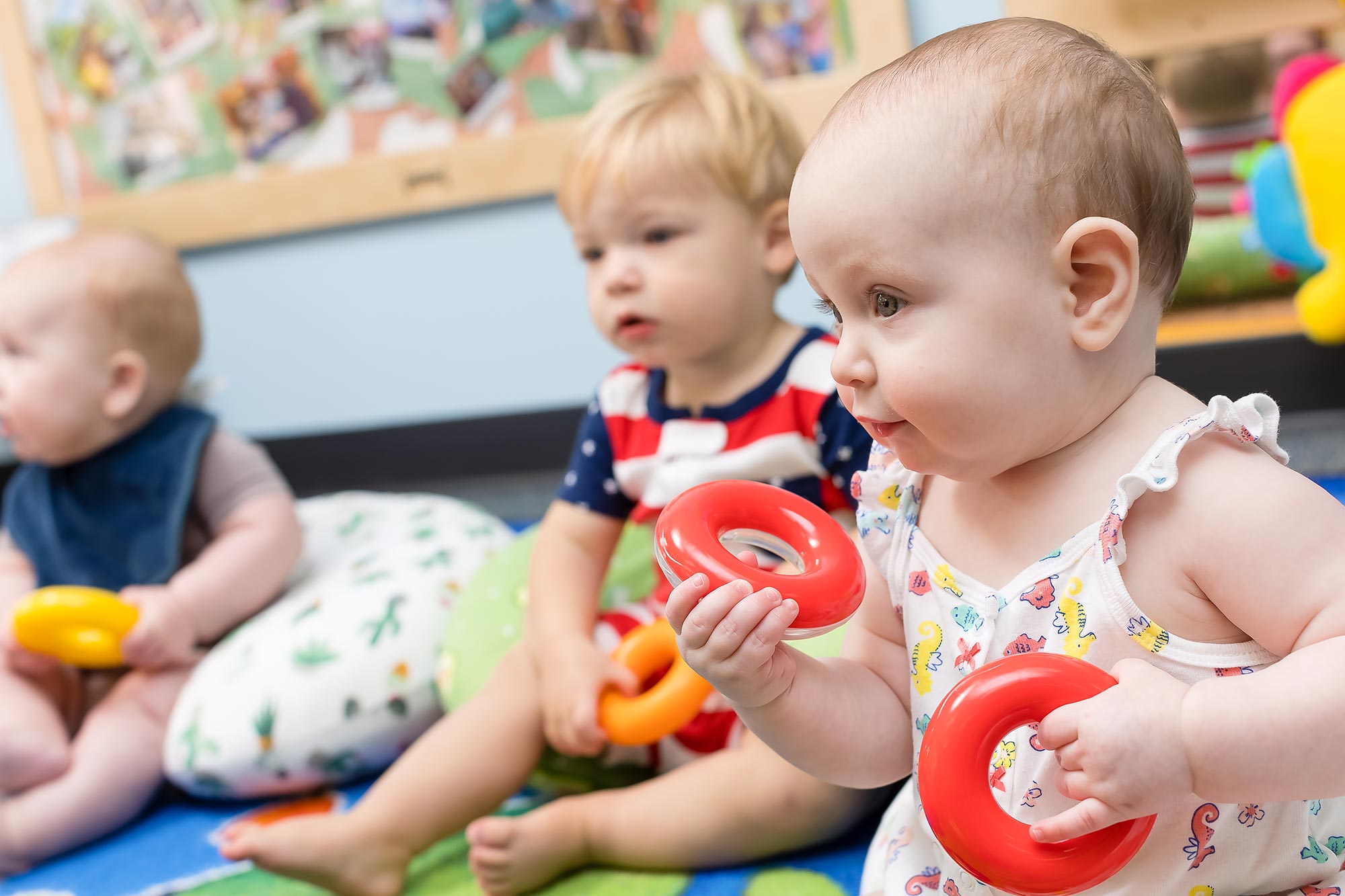 baby playing with toy