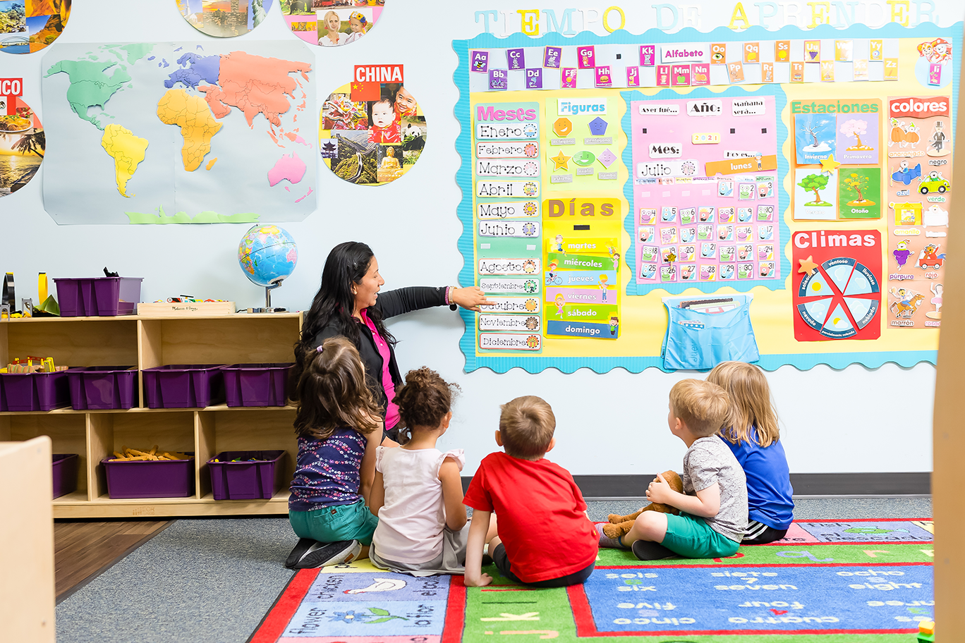 Teacher in classroom with children