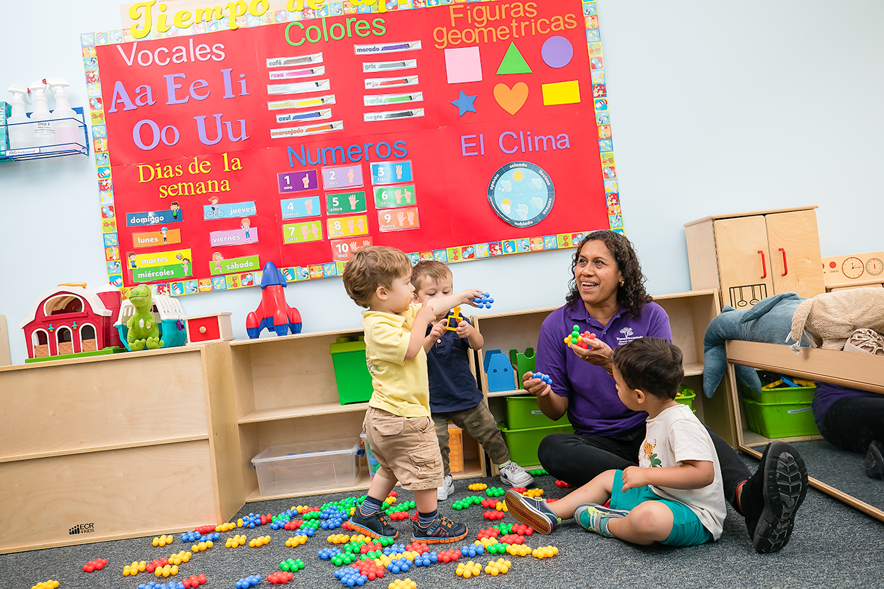 Teacher in classroom with children